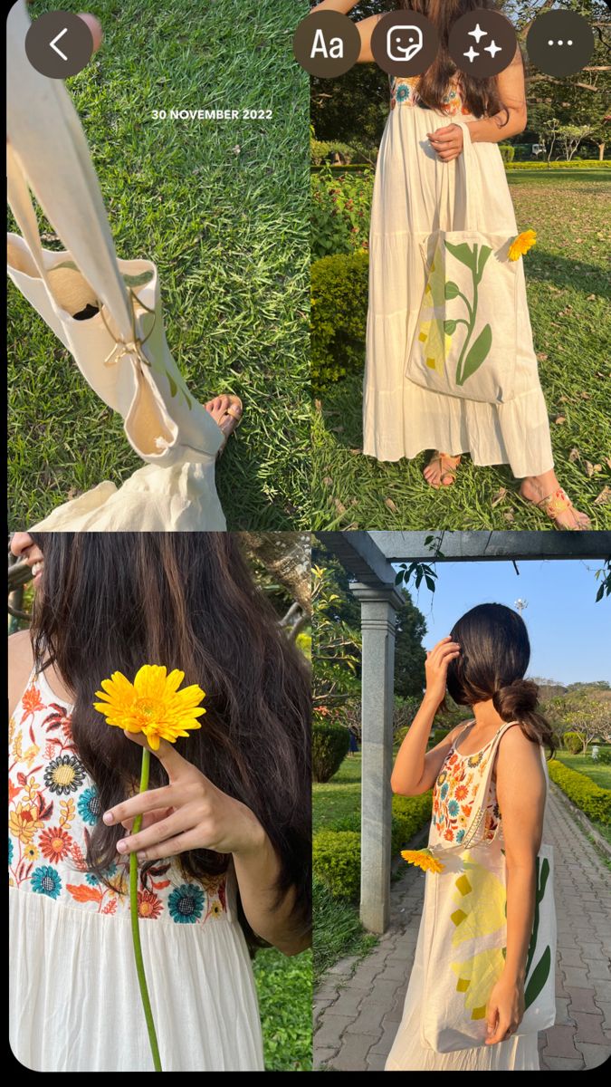 a woman in a white dress holding a yellow flower