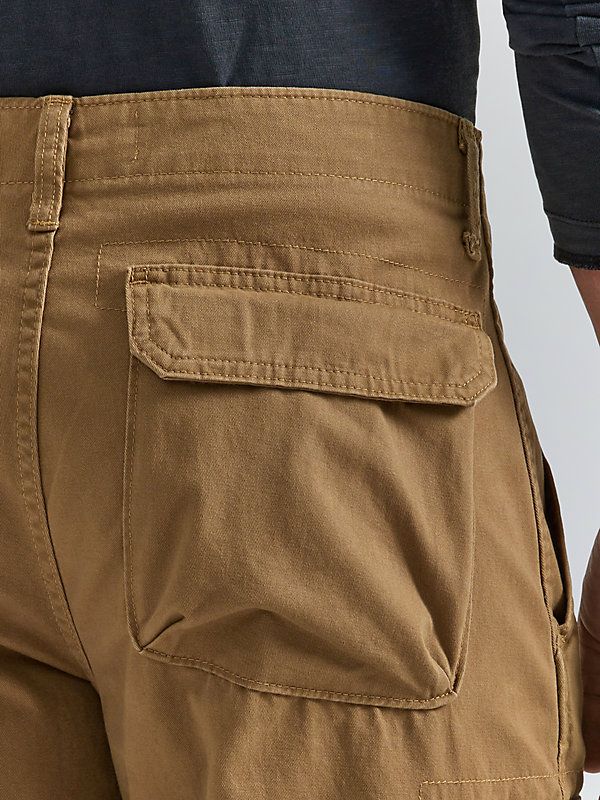 There isn't much you can't do in a pair of men's Wrangler Authentics® cargo shorts. This short is made of 100% cotton for all-day comfort and long-lasting durability. Between its relaxed fit and it's utilitarian styling, this cargo short stands a good chance of becoming your favorite for work, play, and everything in between. Wear it with graphic tees, button-downs, and more. Utility Cotton Cargo Shorts With Patch Pockets, Rugged Relaxed Fit Cotton Bottoms, Relaxed Fit Cotton Utility Cargo Shorts, Rugged Cotton Cargo Pants With Side Pockets, Relaxed Fit Cotton Cargo Shorts For Outdoor, Outdoor Cotton Shorts With Patch Pockets, Cotton Shorts With Patch Pockets For Outdoor, Rugged Khaki Cotton Bottoms, Brown Cotton Cargo Shorts With Side Pockets