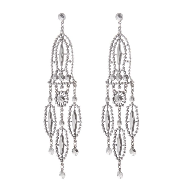 The perfect combination of elegance and strength, the Willow earrings from our Delilah Collection are perfect for powerful women. Handcrafted with intricately designed silver-tone tin alloy, these earrings create a timeless style that is both edgy and utterly chic. Pair with a casual T-shirt or dress up for your next night out. Measurements: 5" x 1" with a clip-on back. All jewelry is made to order in our NYC design studio. Please allow 7-14 business days for production from the order date. Luxury Silver Linear Drop Earrings, Luxury Silver Sterling Linear Earrings, Luxury Silver Chandelier Earrings For Party, Luxury Single Silver Crystal Earring, Silver Oxidized Metal Earrings, Luxury Silver Drop Earrings, Luxury Silver Dangle Earrings, Silver Oxidized Finish Bridal Earrings, Silver Bridal Earrings With Oxidized Finish