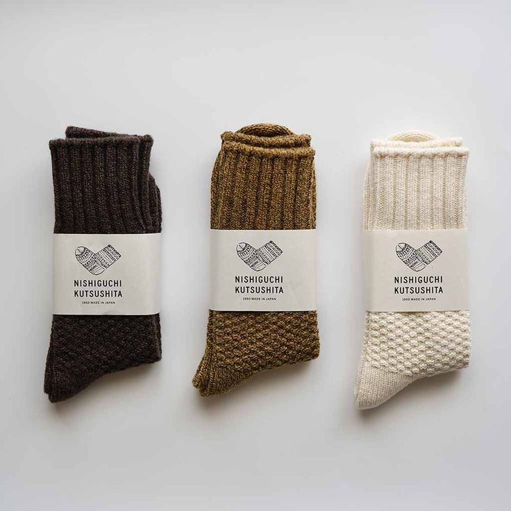 Nishiguchi Kutsushita's Wool Cotton Boot Socks are made with an eco-friendly blend of recycled wool and cotton fibers, perfect with boots for outdoor activities like camping, hiking, or anytime a warm and comfortable sock is needed. Materials: 47% wool, 42% cotton, 10% nylon, 1% elastane (spandex) Made by: Nishiguchi Kutsushita Made in: Japan Specifications: Small fits US men's sizes 5-7 and US women's sizes 6-8. Medium fits US men's sizes 7-9 and US women's sizes 8-10. Large fits US men's sizes Thick Wool Socks, Japanese Socks, Sock Company, Shoe Shelves, Sources Of Fiber, Guys Clothing Styles, Comfortable Socks, European Women, Wool Socks