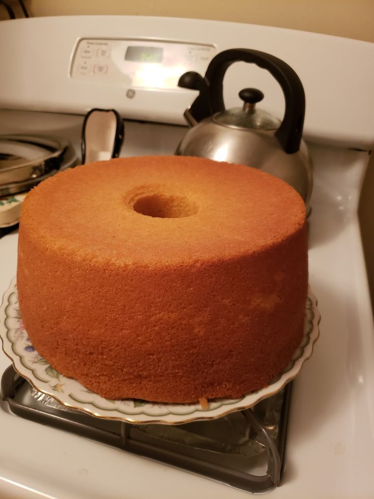 a cake sitting on top of a white stove