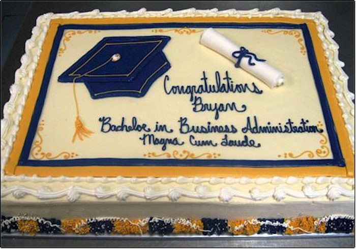 a graduation cake with congratulations written on it