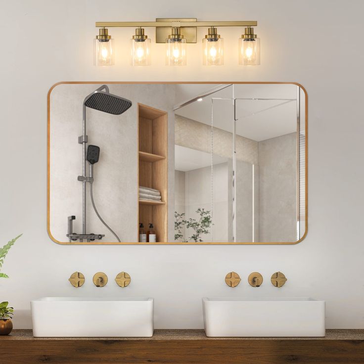 a bathroom with two sinks and a large mirror over it's wall mounted faucet