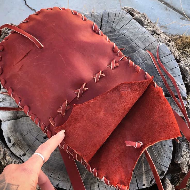 Red rock possibles pouch made with real saddle leather in a deep burnt Sienna. 100% free hand patchwork, no patterns. Imperfections welcome, sturdy as the mountains. Burned mountains scene on front and logo on back Measures about 7.5 inches wide Open- measures 12 inches deep Closed- measures 8 inches deep/tall Brown Leather Outdoor Pouch, Outdoor Brown Leather Pouch, Leather Pouch Bags For Outdoor Activities, Red Leather Festival Bag, Hand Patchwork, Burning Mountain, Star Vinyl, Vinyl Bag, Burnt Sienna