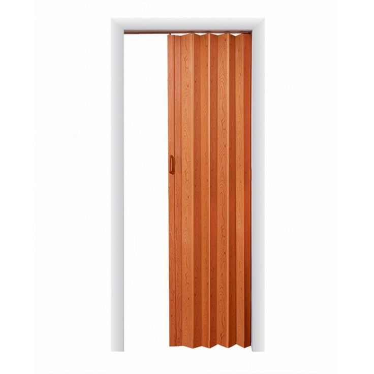 an open door with wooden slats on the side and white trimmings around it