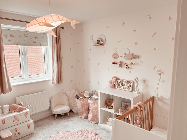 13 Cute and Bubbly Under the Sea-themed Nurseries - Teepee Joy Blog Sea Themed Nursery Pink, Underwater Nursery Theme Girl, Girl Under The Sea Nursery, Pink Ocean Theme Nursery, Coastal Baby Girl Nursery, Pink Ocean Nursery, Nautical Girl Nursery, Ocean Girl Nursery, Ocean Theme Nursery Girl