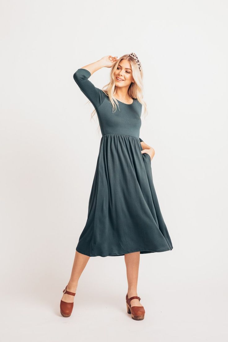 Paula Dress in Hunter Green – GabyVer Modest Maxi Dress With Elastic Waistband, Modest Maternity Midi Dress, Flowy Casual Maternity Dress, Spring Casual Bump Friendly Dresses, Modest Maternity Flowy Dresses, Casual Knee-length Maternity Dresses, Casual Solid Midi Dress With Gathered Waist, Flowy Modest Maternity Dresses, Spring Dresses With Side Pockets And Stretch