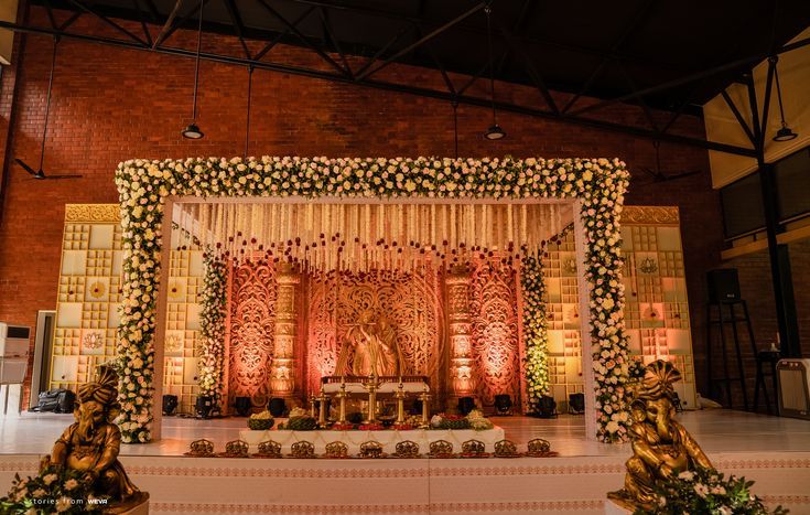 The Most Beautiful Wedding Stage Ideas and Inspiration Hindu Wedding Hall Decorations, Hindu Wedding Entrance Decor, Wedding Hall Stage Decoration, Kerala Wedding Mandapam Decoration, Modern Luxury Wedding Decor, Wedding Auditorium Decorations, Hindu Wedding Stage Decoration Kerala, Kerala Hindu Wedding Stage Decoration, Muhurtham Stage Decoration