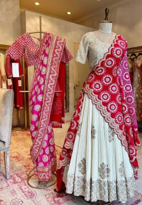 a white and red dress on display in a store