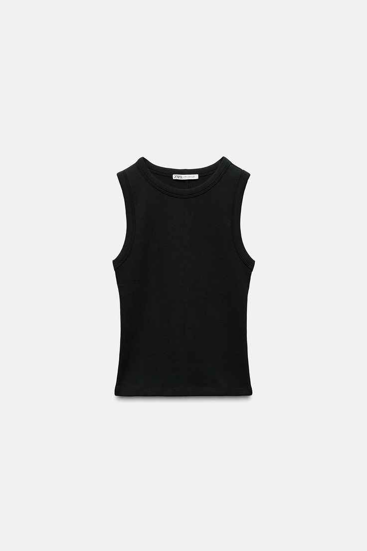 Basic Sleeveless Ribbed Top, Basic Ribbed Sleeveless Top, Black Sleeveless Top With Ribbed Neckline, Fitted Ribbed Tank Top With Crew Neck, Ribbed Fitted Crew Neck Tank Top, Sleeveless Ribbed Stretch Tops, Casual Fitted Tank Top With Ribbed Neckline, Ribbed Stretch Tank Top, Crew Neck Tank Top For Layering With Ribbed Neckline