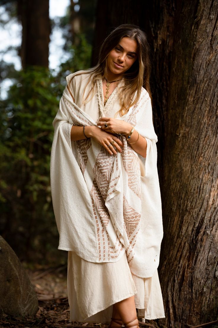 The Free Mind Kimono is designed to be light and breezy. Featuring a unique, tribal block print and made with natural colours and fibres. This kimono is a beautiful addition to a bohemian wardrobe, perfect to drape over an outfit to add a touch of alternative style. Material : 100% Cotton Hand made with Love ❀ Beige Bohemian Long Kimono, Beige Flowy Bohemian Kimono, Beige Long Bohemian Kimono, Flowy Bohemian Beige Kimono, Bohemian Beige Kimono For Beach Cover-up, Beige Bohemian Kimono For Beach Cover-up, Bohemian Beige Kaftan For Spring, Beige Bohemian Kaftan For Spring, Spring Bohemian Beige Kaftan