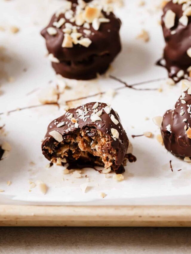 chocolate covered desserts are on a tray ready to be eaten