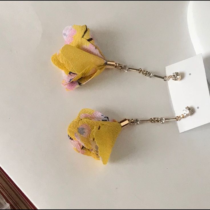 High Quality Yellow Flower Earrings For Party, Chic Flower-shaped Earrings For Spring, Elegant Yellow Dangle Flower Earrings, Elegant Floral Print Flower Earrings For Spring, Elegant Yellow Flower Earrings For Summer, Elegant Spring Flower Earrings With Floral Print, Yellow Flower Drop Earrings For Party, Yellow Flower-shaped Earrings For Party, Handmade Flower Dangle Earrings For Spring