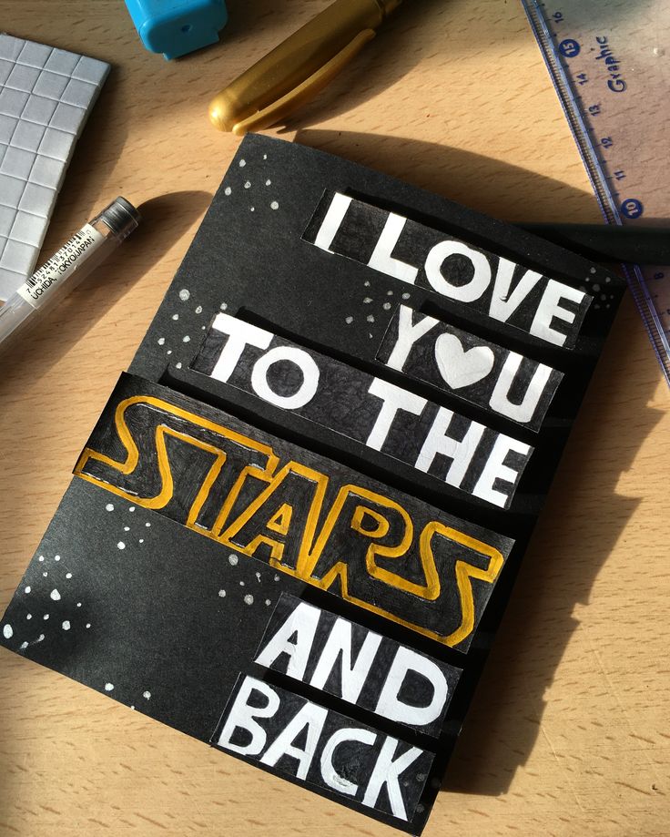 i love you to the star wars and back book on a desk with pens, rulers and pencils