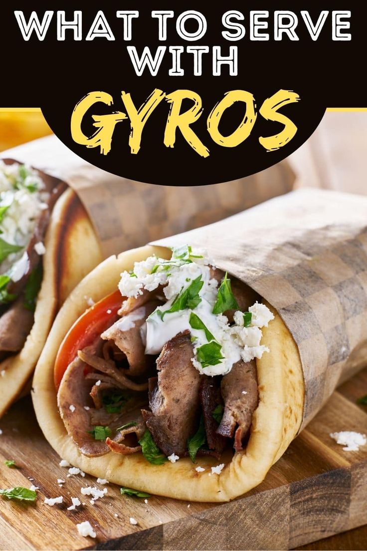 two burritos on a cutting board with the words what to serve with gyros