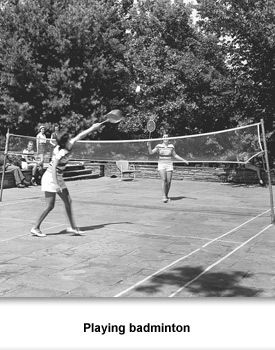 black and white photograph of people playing tennis