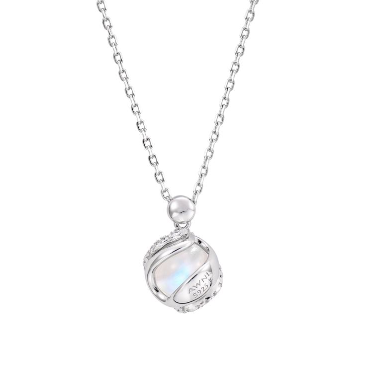 Adorn yourself with this exquisite blue moonstone pendant necklace. Its shimmering light blue luster and handcrafted sterling silver frame evoke the glimmer of the aurora borealis and snow. The rotating crystal ball pendant emanates calming, stabilizing feminine energy to promote relationships, boost your aura, and unlock love. Rejoice in this handmade piece's beauty and power. Silver Moonstone Clavicle Necklace, Silver Moonstone Clavicle Chain Necklace, Silver Clavicle Chain Necklace With Moonstone, Elegant Moonstone Necklace With Moon Charm, Elegant Moonstone Clavicle Chain Jewelry, Elegant Moonstone Necklace With Moon Phase Detail, Elegant Moonstone Necklace With Moon Phase, Silver Ethereal Necklace With Moon Charm, Silver Crystal Necklaces With Birthstone, Moonstone