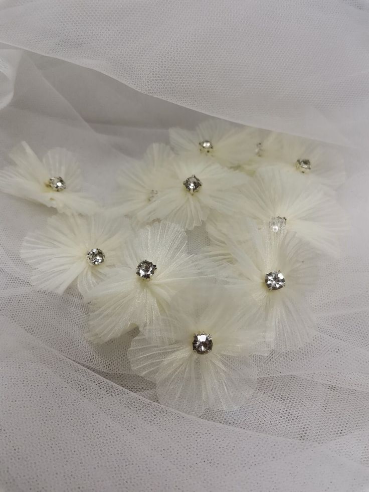 Description: Pleated organza 3D lace applique, crystal beaded bodice applique for wedding dress, flower girl dress, earring clip design, Millinery ◆ This listing is for 5 Pcs / 10 Pcs / 15 Pcs ◆ Width: About 5 cm (1.97'' ) ◆Application: Glue on / Sew On organza flower patch ◆ These are lovely for decorating your dress, boutique accessories, doggies, craft, hat, bag, any sewing etc... For more quantity, please feel free to convo me for custom listing Thank you for stopping by my store. ♡ ♡ White Embellished Tulle Fabric For Party, Elegant White Embellished Tulle Fabric, White Organza Tulle Fabric With Floral Applique, White Floral Tulle Fabric, Pleated Organza, Bodice Applique, Strawberry Dress, Clip Design, Organza Flowers