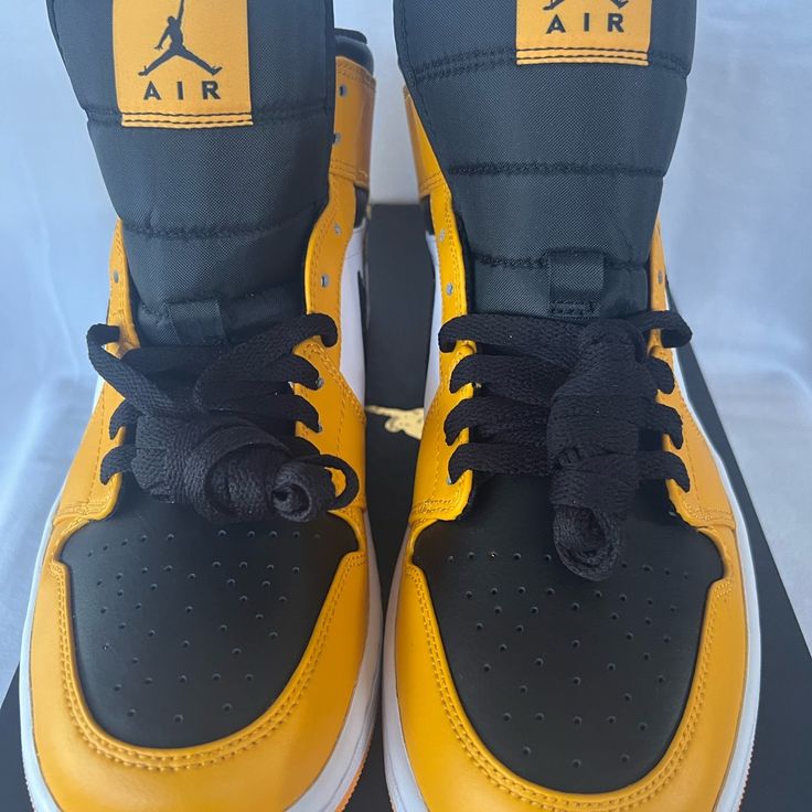 Air Jordan One Mid Taxi Brand New With Original Box Yellow Sneakers With Contrast Sole And Round Toe, Yellow Casual Basketball Shoes With Contrast Sole, Casual Yellow Basketball Shoes With Contrast Sole, Yellow Low-top Basketball Shoes With Contrast Sole, Yellow Leather Sneakers With Boost Midsole, Yellow Basketball Shoes With Contrast Sole, Yellow Synthetic Basketball Shoes With Boost Midsole, Sporty Yellow Jordan Lace-up Shoes, Casual Custom Yellow Sneakers With Contrast Sole