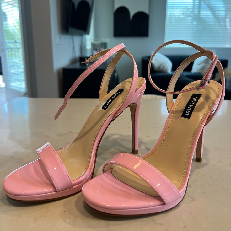 Brand New Never Worn. Make A Striking Statement In This Open-Toe Ankle-Strap Sandal Lifted With A Subtle Platform And Sky-High Stiletto Heel. 4 1/4" Heel; 1/2" Platform Box Not Included. Pink Strappy Sandals With 4-inch Heel, Pink Double Strap Sandals For Spring, Pink Strappy Heels For Party, Pink Ankle Strap Sandals, Pink Strappy Sandals With Adjustable Strap, Summer High Heels With Single Strap, Fitted Sandals With Adjustable Strap For Summer, Summer Single Strap High Heels, Pink Ankle Strap Heels With Straps