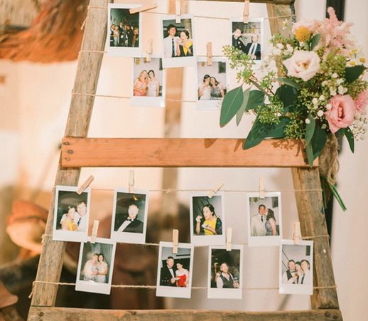 a wooden ladder with photos hanging from it's sides and the words, bridal guide