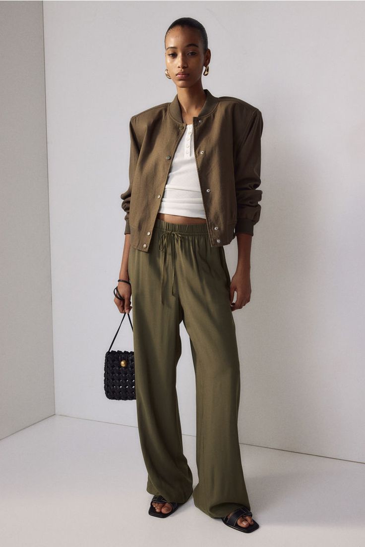 Loose-fit pants in airy  woven viscose fabric. High waist  narrow drawstring and covered elastic at waistband  and discreet side-seam pockets. Straight  wide legs. Dark Khaki, Fit Pants, Viscose Fabric, Wide Legs, Pull On Pants, Khaki Green, Summer Wardrobe, Workout Pants, High Waist