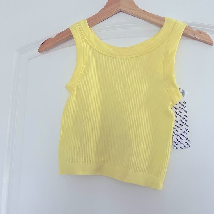 New With Tags Urban Outfitters Tank Top! Summer May Be Almost Over But Buy This Tank To Wear It Next Year Or If You Live In A Natural Hot Climate! Size: Xs Smoke Free Home! Casual Yellow Seamless Tops, Casual Yellow Tank Crop Top, Casual Cropped Yellow Tank Top, Ribbed Tops For Summer Day Out, Summer Ribbed Tops For A Day Out, Ribbed Tops For A Summer Day Out, Urban Outfitters Seamless Summer Crop Top, Urban Outfitters Seamless Crop Top For Summer, Yellow Urban Outfitters Top For Spring