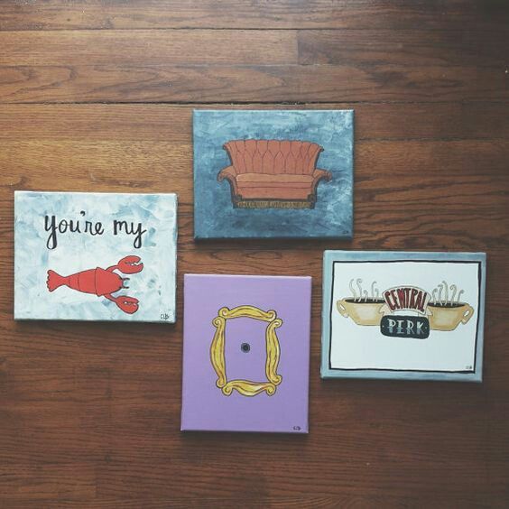 four different greeting cards on a wooden surface