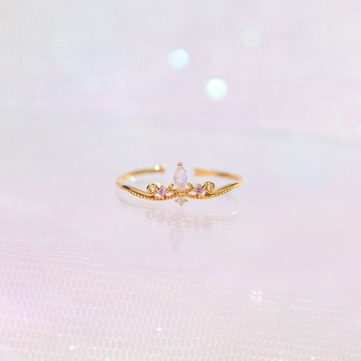 A ring fit for royalty! Our Her Highness Ring is the best accessory for when you want to add elegance, glam, and fierceness to your look! 18k gold plated, 18k rose gold plated, or rhodium plated over brass with a protective coating Cubic zirconia stones Slightly adjustable Approx 7mm width Shop our entire Magical Colle Princess Vintage, Cute Clothing Stores, To Buy List, Engagement Ring Ideas, Always Shine, Sparkling Rings, Necklace Chain Lengths, Buy List, Ring Fit