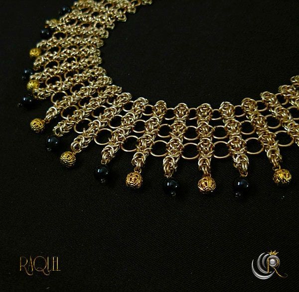 "This spectacular gold tone chainmail collar makes quite the statement. It commands attention. It is perfect to accent a black dress for evening or a white blouse during the date. This handcrafted statement necklace is made of German gold style  jump rings, individually opened and closed in the Byzantine pattern creating vertical links connected with three ring sizes. It will not, rust or corrode over time. If cleaning is needed, a simple rinse with soap and warm water will do.  Adorned with 6mm Gold Metal Chain Choker, Elegant Chain Link Choker For Party, Gold Chain Link Choker For Party, Elegant Metal Chain Necklace With Gold Beads, Elegant Black Chainmail Jewelry, Elegant Chain Necklace With Gold Beads, Gold Bib Necklace Choker, Elegant Gold Choker Bib Necklace, Gold Beaded Choker For Parties