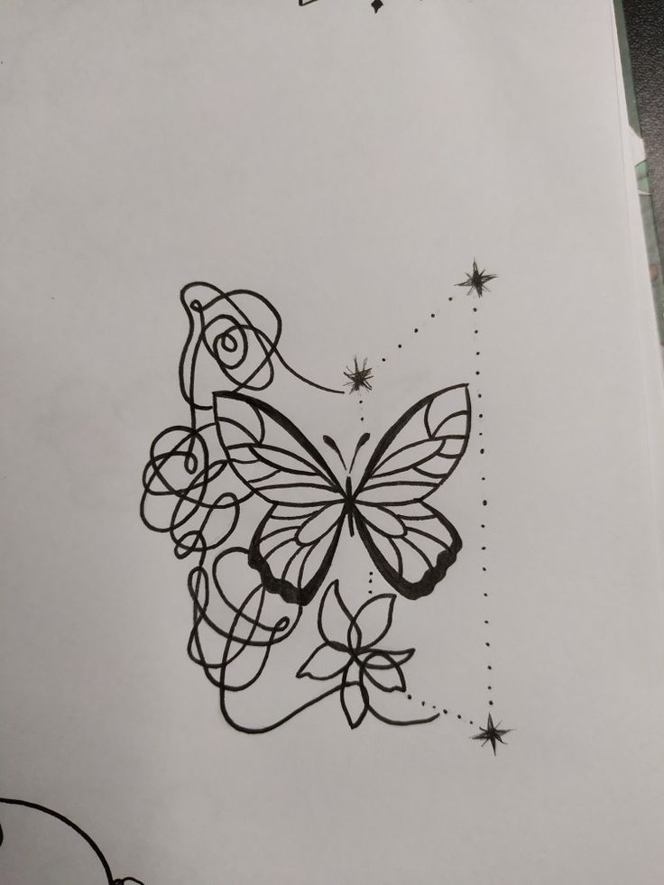 a drawing of a butterfly with stars on it