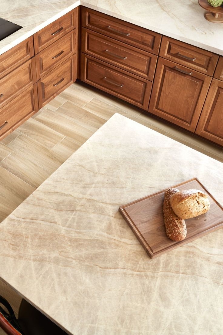 a loaf of bread sitting on top of a cutting board