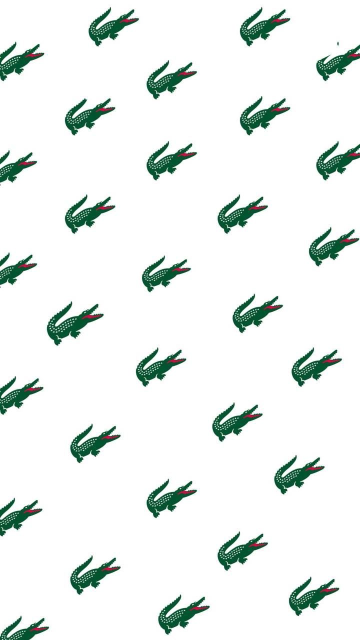 an alligator pattern is shown in green on a white background with red and black stripes