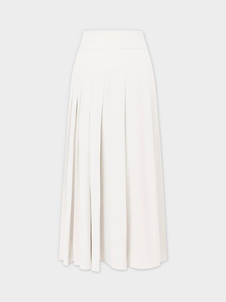 Experience effortless style with our Yolk Pleated Skirt in a classic white hue. The 37" length provides elegant coverage, while the pleated design adds texture to your look. Elegant A-line Maxi Skirt With Pleated Hem, White A-line Formal Bottoms, White Relaxed A-line Skirt, Elegant Summer Maxi Skirt With Pleated Hem, White Fitted A-line Bottoms, Elegant Fitted Maxi Skirt With Pleated Hem, Elegant Flowy Maxi Skirt With Accordion Pleats, Elegant White A-line Pleated Skirt, White Flared Maxi Skirt For Work