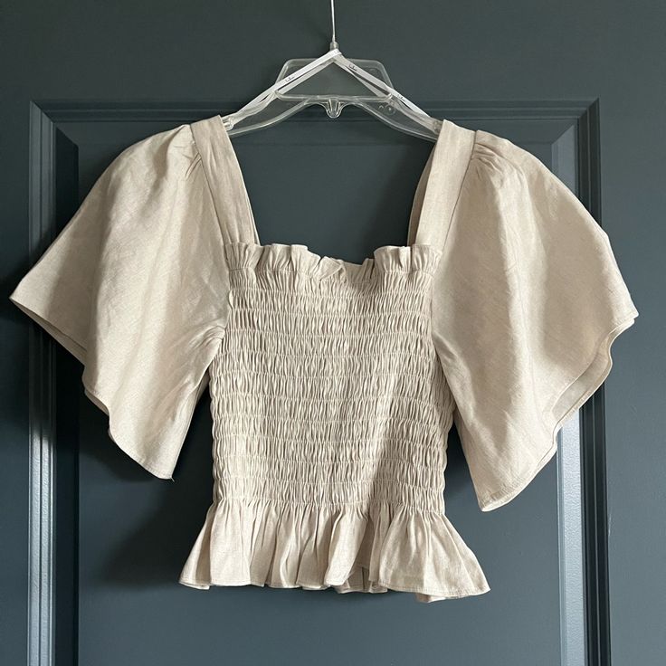 Ruched Linen/Cotton Blend Blouse With Flowy Sleeves. Nwt. Beige Summer Blouse With Smocked Bodice, Spring Beige Ruched Top, Cream Tops With Smocked Bodice, Cream Smocked Bodice Top, Beige Ruched Blouse For Spring, Casual Cream Top With Smocked Back, Spring Beige Ruched Blouse, Casual Cream Tops With Smocked Back, Fitted Beige Top With Smocked Bodice