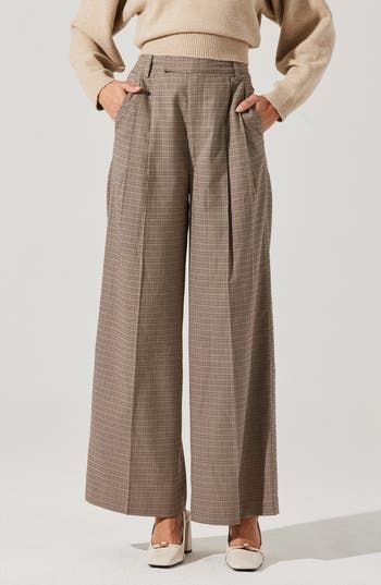 A crisp houndstooth check brings preppy polish to wide-leg pants complete with tasteful pleats and plenty of pockets. Zip fly with hook-and-bar closure Front slant pockets; back welt pockets 97% polyester, 3% elastane Dry clean Imported Chic Plaid Wide Leg Pants, Formal Plaid Wide Leg Bottoms, Tailored Houndstooth Bottoms For Fall, Classic Houndstooth Bottoms For Workwear, Classic Houndstooth Bottoms For Work, Elegant Plaid Wide-leg Pants, Business Casual Wide Leg Houndstooth Bottoms, Plaid Workwear Bottoms With Belt Loops, Plaid Wide Leg Formal Pants