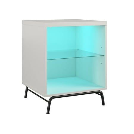 a white cabinet with blue lights on the front and black legs, against a white background