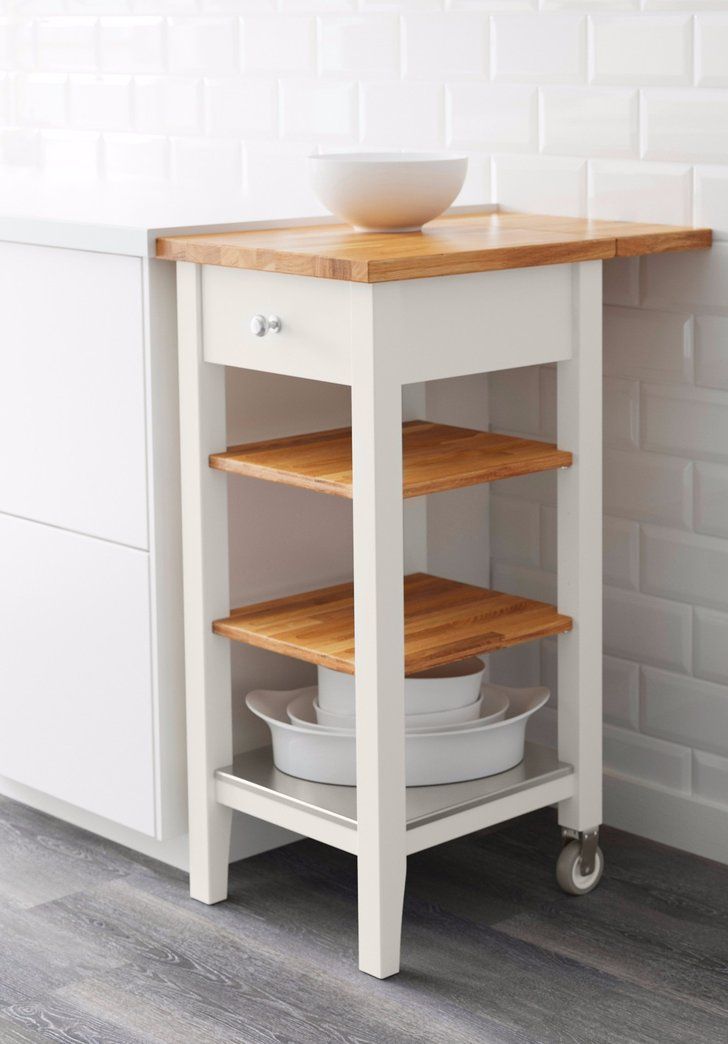 a kitchen cart with two bowls on it