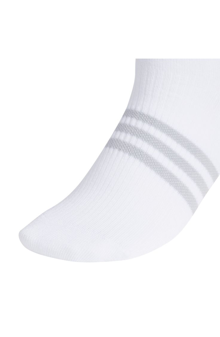 Upgrade your staples with a pack of quarter-length performance socks crafted with arch compression cushioning and AEROREADY to keep you dry and comfortable. Pack of six pairs Polyester/spandex Machine wash, tumble dry Imported White Sports Socks With Arch Support, Sporty White Slip-resistant Socks, White Antimicrobial Functional Socks, White Sweat-resistant Athleisure Socks, Adidas Breathable White Socks, White Slip-resistant Sporty Socks, White Moisture-wicking Athleisure Socks, White Slip-resistant Training Socks, Adidas White Breathable Socks