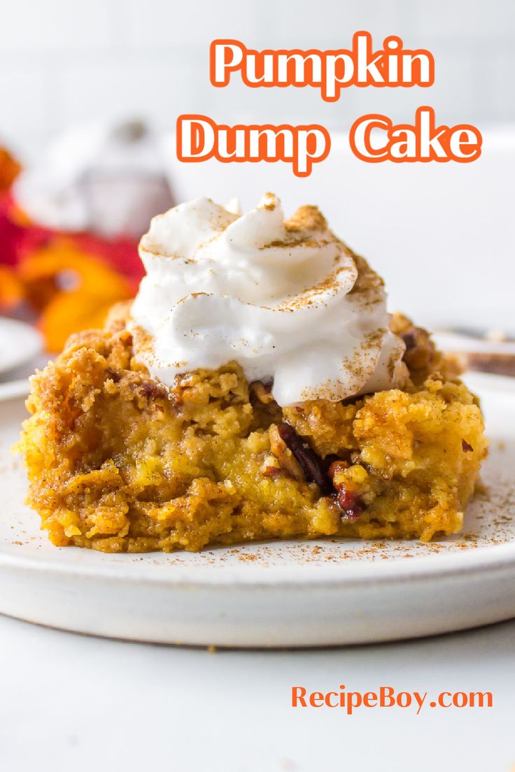 pumpkin dump cake on a white plate with whipped cream in the middle and text overlay that reads, pumpkin dump cake