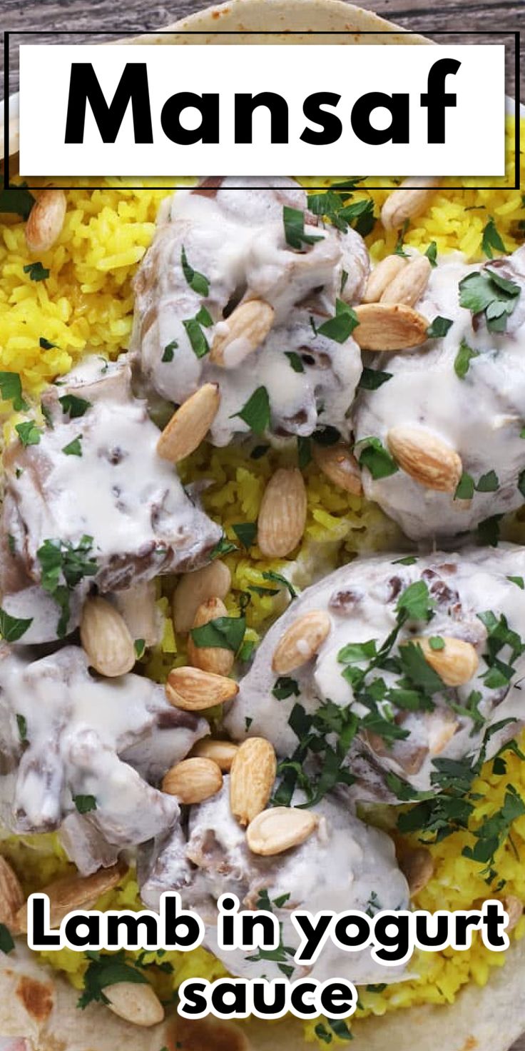 a plate filled with meat covered in white sauce and garnished with almonds