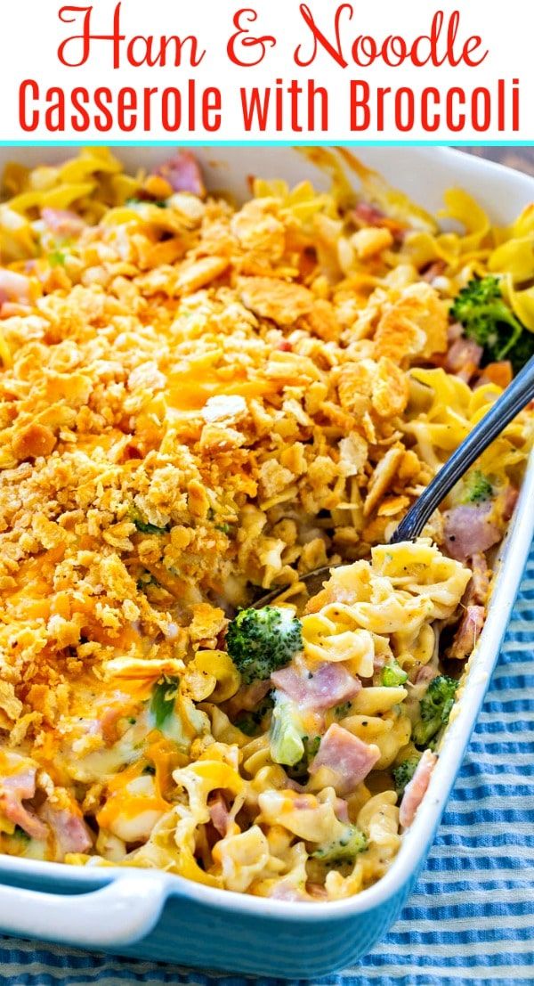 ham and noodle casserole with broccoli in a blue dish