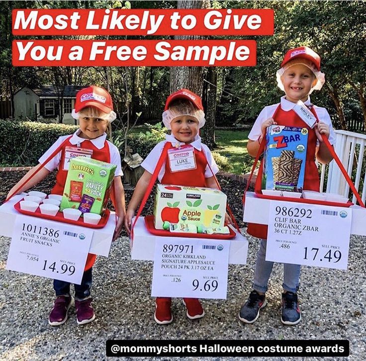 three children in red and white uniforms holding up boxes with food items on them while standing next to each other