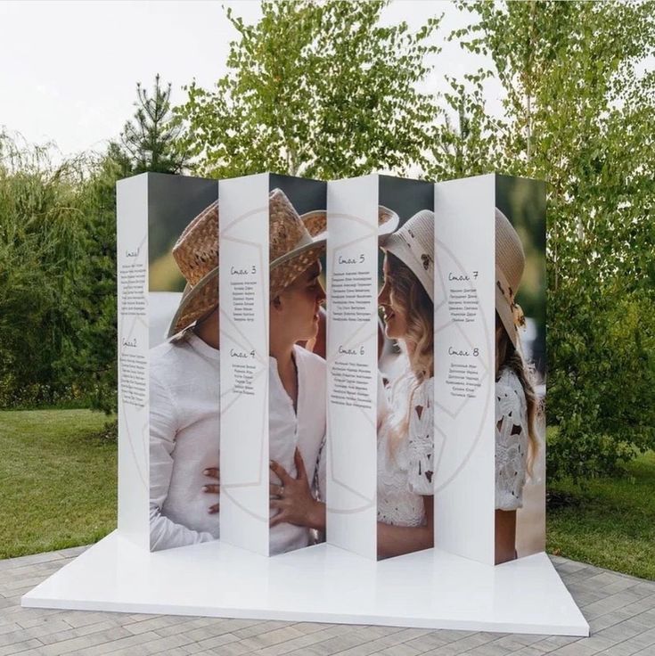 an outdoor display with three different pictures on it