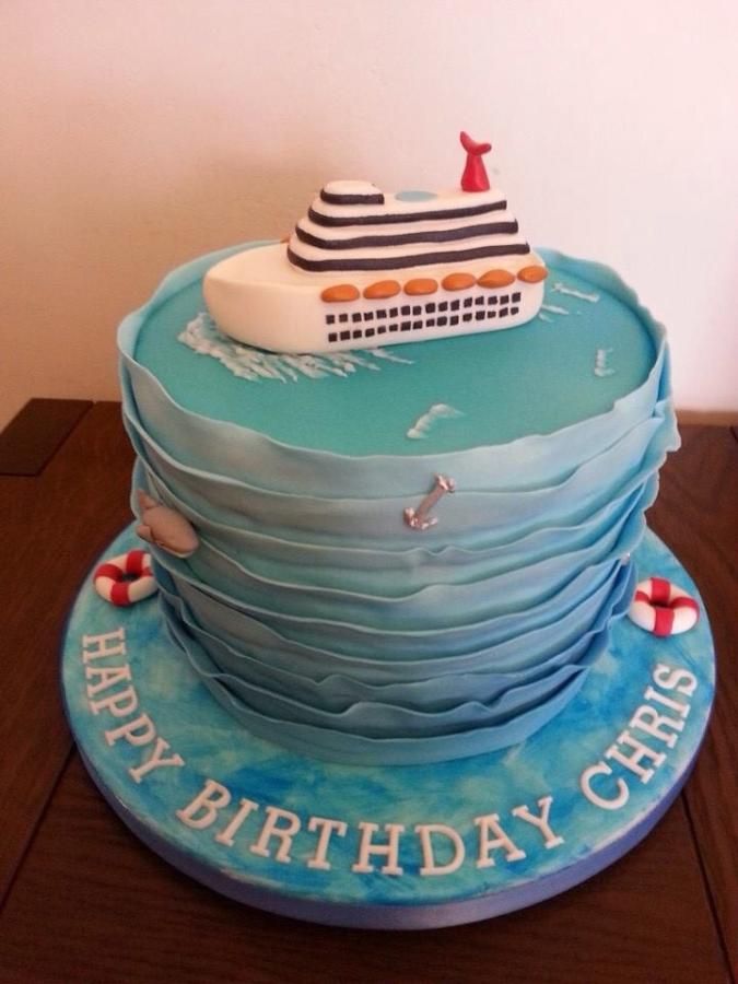 a birthday cake with a cruise ship on it