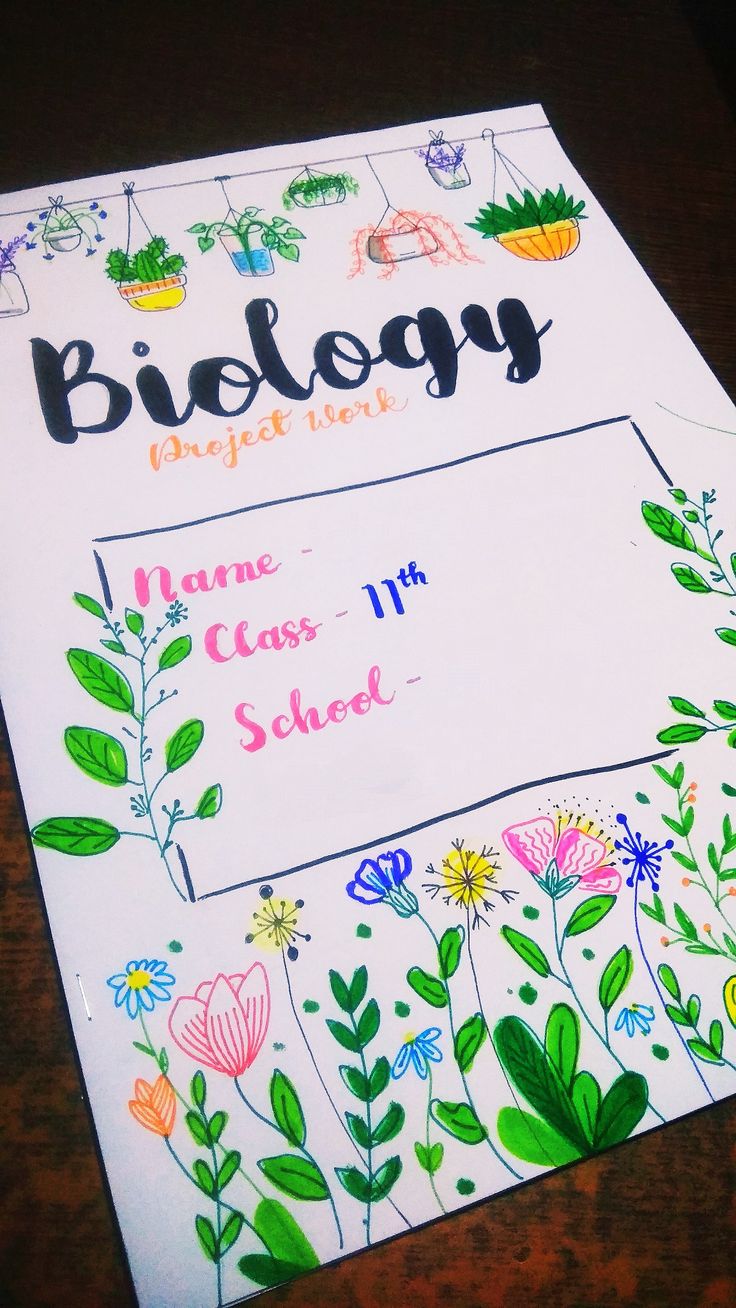 a close up of a piece of paper with flowers on it and the words biolegy written in black