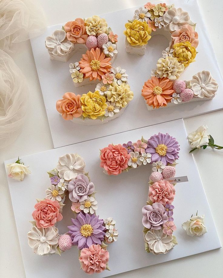 flowers are arranged in the shape of the letter e and o on top of each other