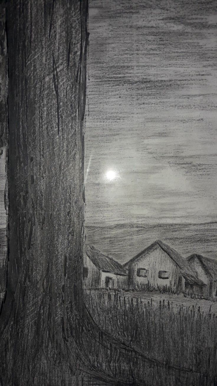 a black and white drawing of a tree with houses in the background