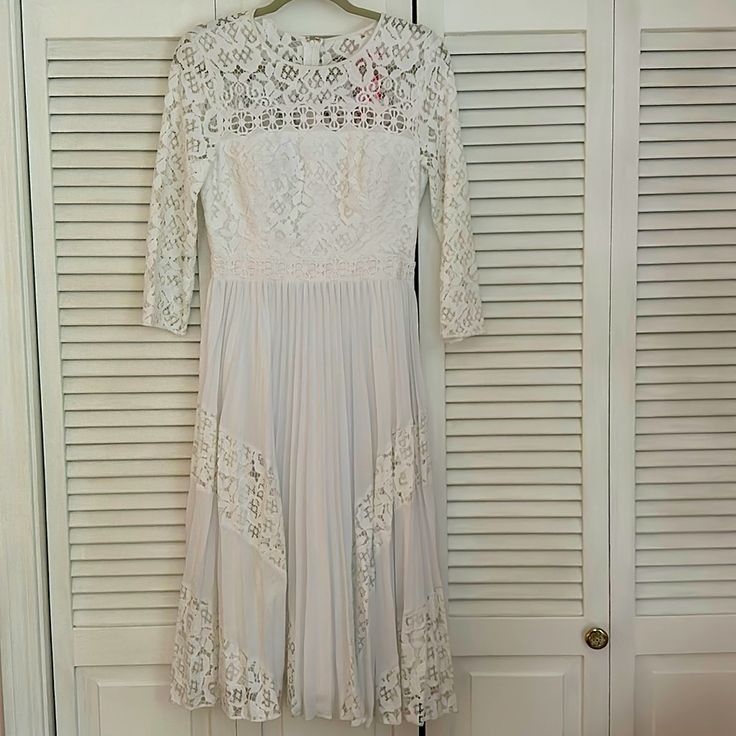 Lilly Pulitzer White Lace Dress Size 4 New With Tags Fitted Lace Pleated Midi Dress, Fitted Lace Midi Dress With Pleats, Pleated Lace Midi Dresses, Lace Pleated Midi Dresses, Fitted Pleated Lace Dress, Fitted Lace Pleated Dress, Pleated Lace Wedding Dress, Spring Lace Midi Dress Fit And Flare, Spring Fit And Flare Lace Midi Dress