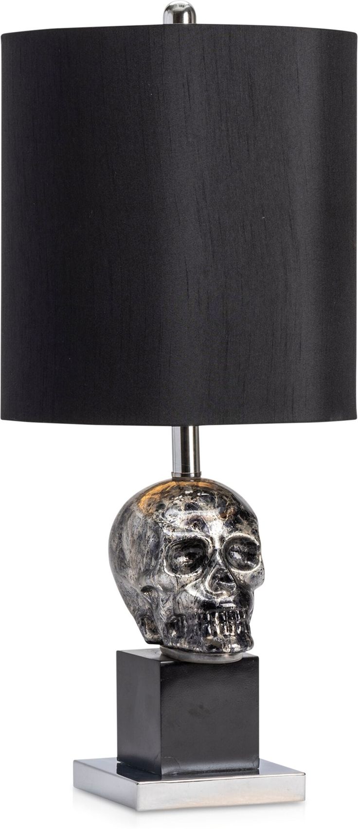 a table lamp with a black shade on it and a skull head in the middle